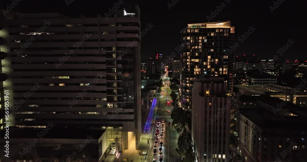 San Jose California Aerial v7 low level drone flyover from horace mann along santa clara street towards downtown capturing illuminated urban cityscape at night - Shot with Mavic 3 Cine - June 2022 San Jose California Aerial v7 low level drone flyover from horace mann along santa clara street towards downtown capturing illuminated urban cityscape at night - Shot with Mavic 3 Cine - June 2022