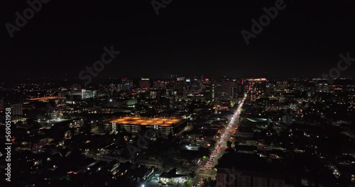 San Jose California Aerial v2 cinematic drone flyover santa clara street across the city capturing busy traffics and illuminated downtown cityscape at night - Shot with Mavic 3 Cine - June 2022 photo