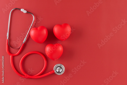 Red statoscope with red heart for Valentine day, World Health Day,World Blood Donor Day and Doctor day for concept top view background.