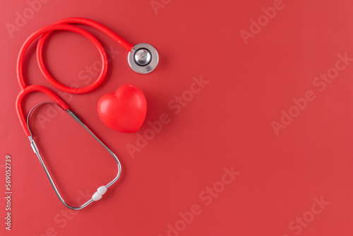 Red statoscope with red heart for Valentine day, World Health Day,World Blood Donor Day and Doctor day for concept top view background.