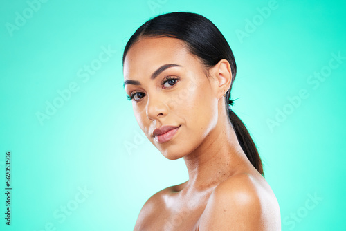 Skincare, beauty and black woman isolated on a green background for cosmetics glow, shine and facial mockup. Portrait of a young model or beautiful person in studio mock up for dermatology wellness