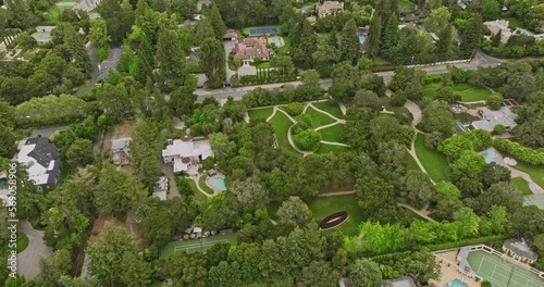 Atherton California Aerial v7 cinematic fly around beautiful scenic town capturing upscale homes in wooded residential area with abundant open space and greenery - Shot with Mavic 3 Cine - June 2022 photo