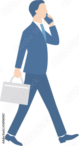 電話しながら歩くビジネスマン