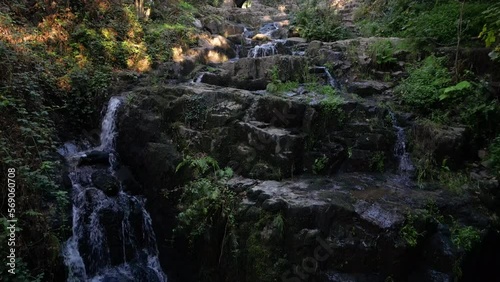 Mortain waterfall, Manche in France. Aerial drone descending low altitude photo