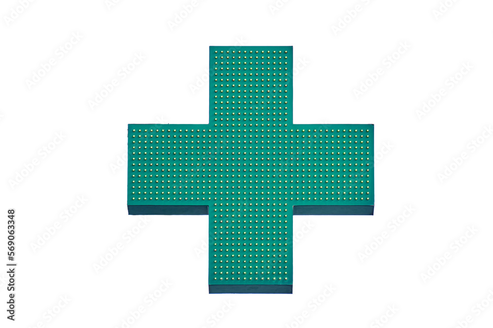Green cross of a pharmacy store on the wall of a building, isolated on a white background Green cross of a pharmacy store on the wall of a building, isolated on a white background