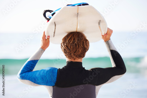 Photography Surfing, sports and man by sea for fitness, exercise or training and walking to ocean water
