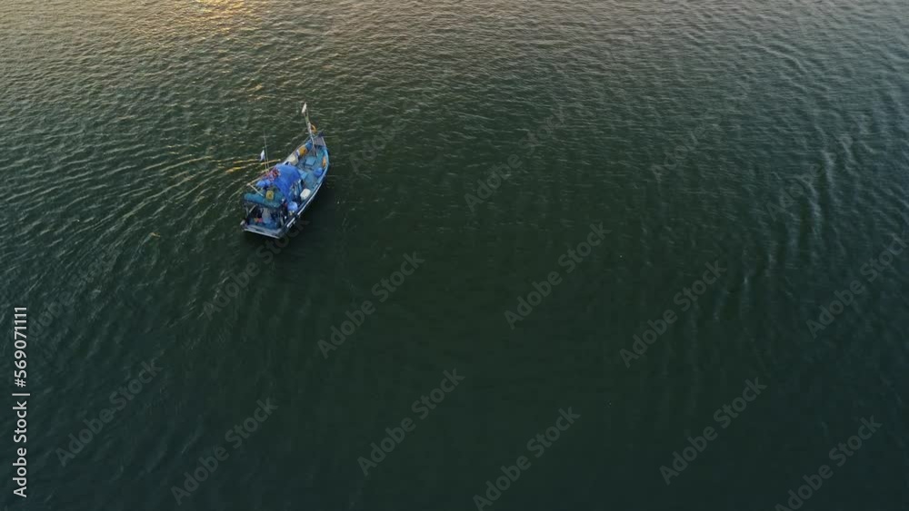 fishing boat on the river in Goa fishing boat on the river in Goa