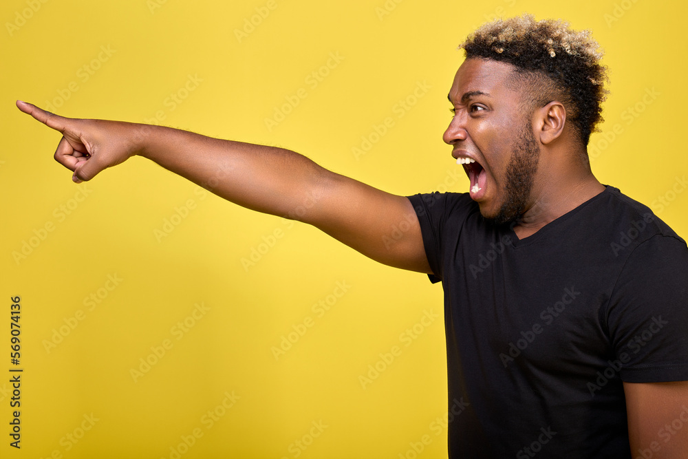 Man menacingly screaming at the phone Stock Photo