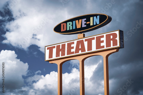 Retro drive-in theater sign with clouds