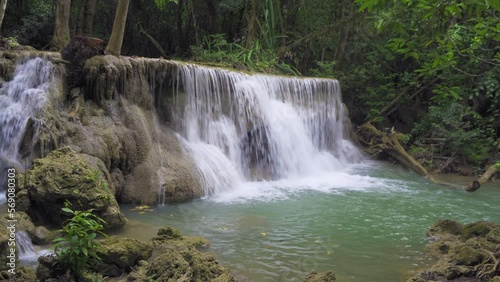 Erawan Waterfall. Nature landscape of Kanchanaburi district in natural area. it is located in Thailand for travel trip on holiday and vacation background, tourist attraction.