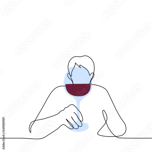 man sitting with glass of wine looking through glass - one line drawing vector. concept of drinking alone, wine alcoholic, sommelier or taster checks the quality of the drink