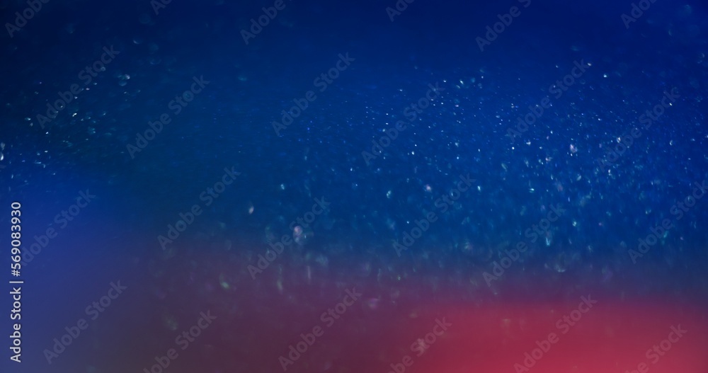 Blur color glow. Bokeh light flare. Shimmering radiance. Defocused neon blue pink glare glitter texture abstract background with free space.