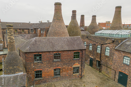Stoke-on-trent, Staffordshire, England, March 3 2023. Old Gladstone Potteries with bottle ovens in the centre of Stoke on Trent, Staffordshire,UK. Industrial architecture in England photo