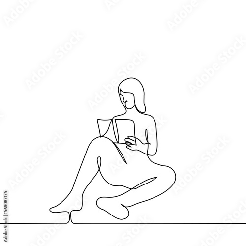 woman sits with a book on the floor or on the ground - one line drawing vector. the concept of reading a paper book, leisure or hobby, book lover or student studying from a textbook
