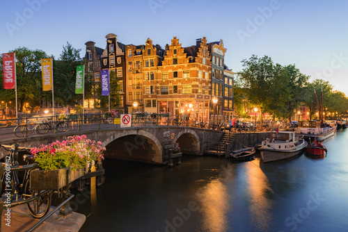 Amsterdam Canals with bridge and Traditional Dutch houses, Netherlands