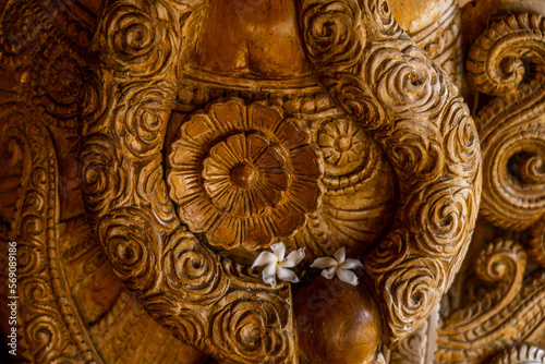 Close up of the wooden carving detail, Alleppey, Kerala, India.  photo