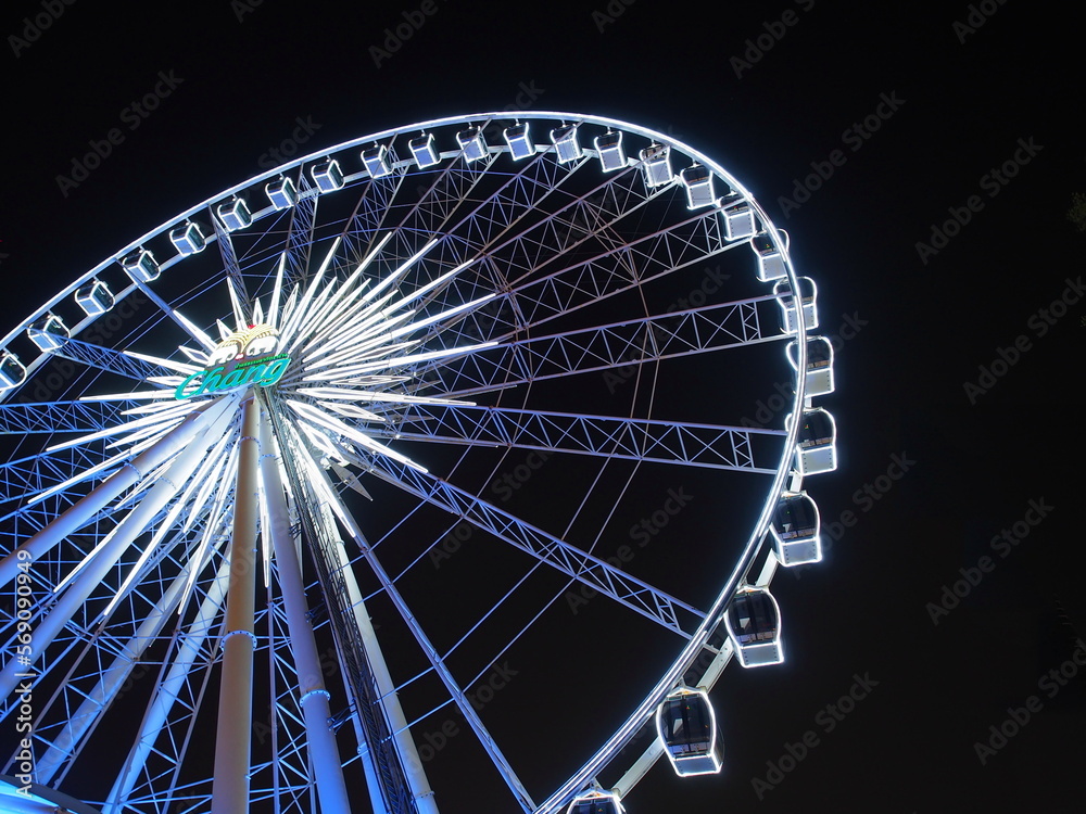 BANGKOK - February 5: Night scene of the Large Ferris wheel in Asiatique, open outdoor community shopping mall in Bangkok, Thailand, under dark night sky, on February 5, 2023.