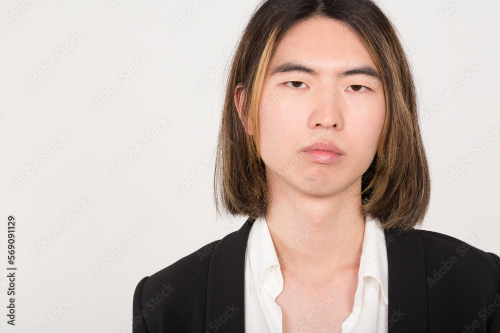 Close up portrait of a serious asian young man Close up portrait of a serious asian young man