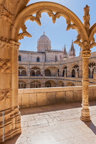 Mosteiro dos Jeronimos viewed through arch, Lisbon, Portugal photo