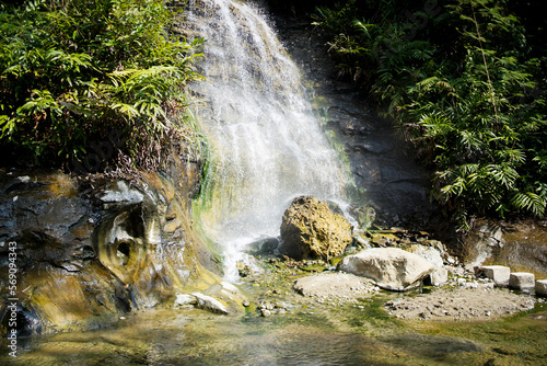 hot waterfall with rocky coral photo