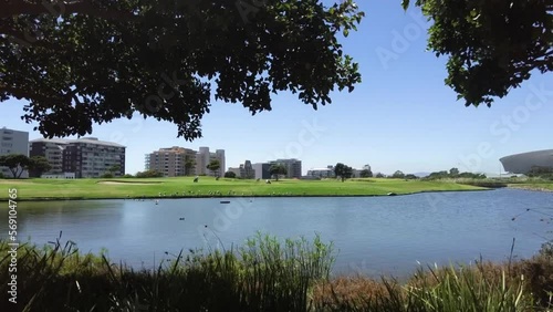 A tracking shot of Cape Town Stadium from Green Point Urban Park,