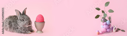 Banner with Easter eggs and bunny on pink background