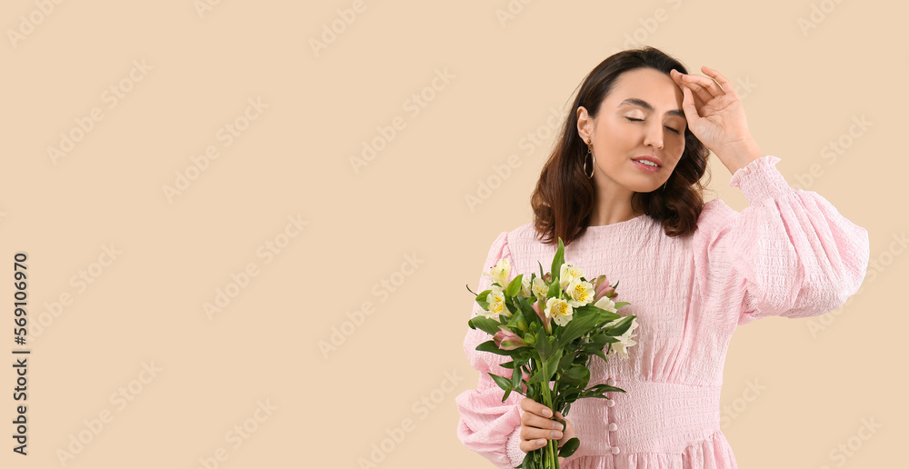 Beautiful young woman with bouquet of alstroemeria flowers on beige background with space for text
