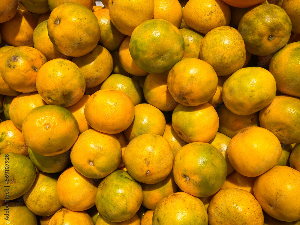 Mandarin orange fruit in the basket at the supermarket