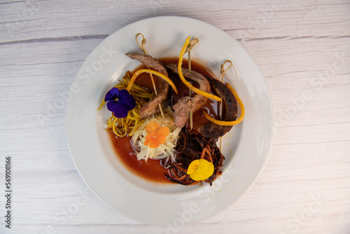 Recipe for duck aiguillettes with three-coloured turnips and orange caramel port sauce, High quality photo