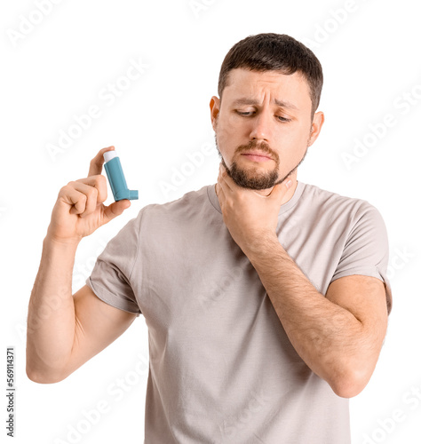 Sick man with inhaler on wh...