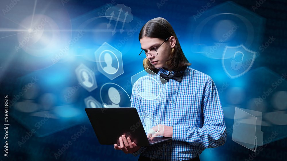 Young male using laptop for texting, communication, learning, information storage. Young male using laptop for texting, communication, learning, information storage.