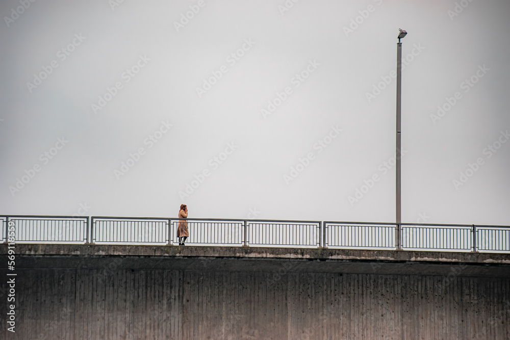 person standing on a pier