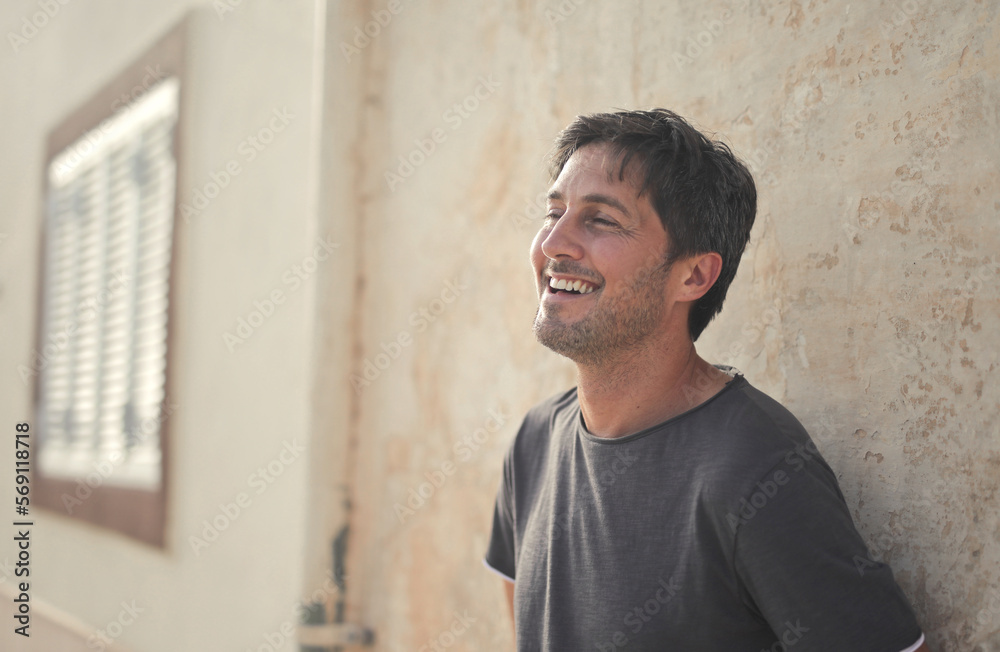 Fototapeta premium portrait of young laughing man