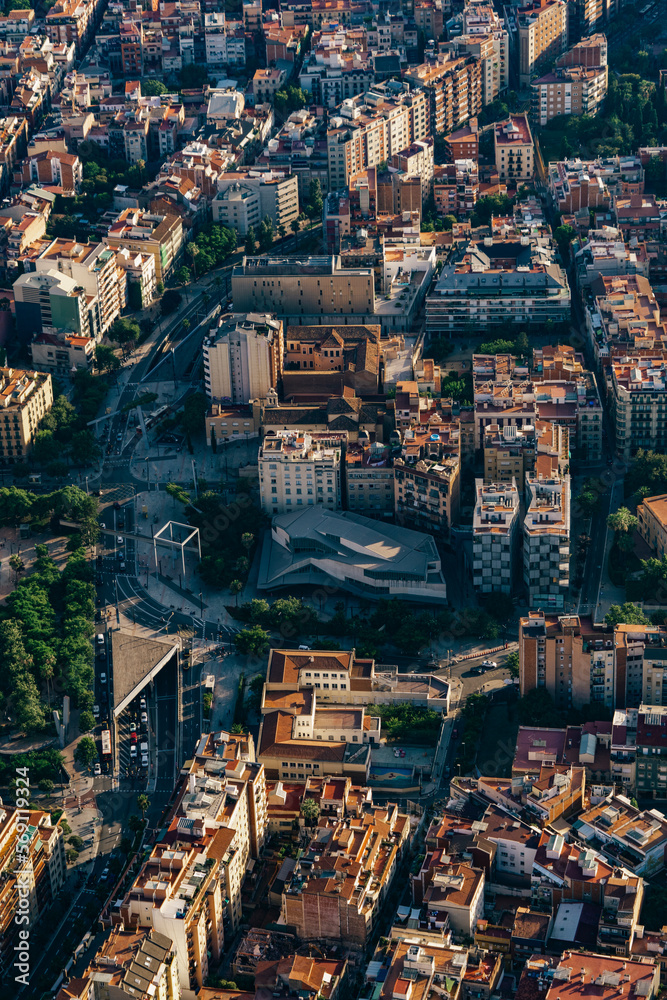 Aerial view of Ronda del Mig of the city and with the typical buildings of Barcelona cityscape from helicopter. top view. Neighborhood.