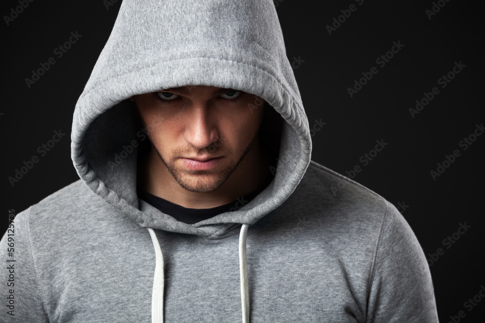 Studio portrait of cool looking young guy in sportswear. Studio portrait of cool looking young guy in sportswear.