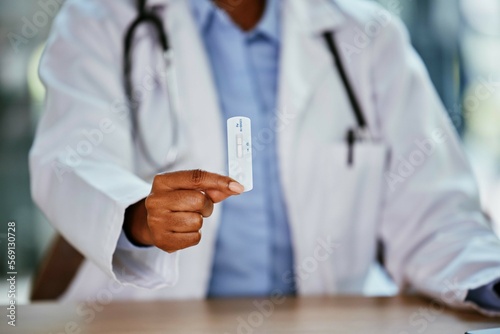 Covid, antigen test and doctor hand for healthcare, compliance or insurance in hospital office bokeh. Pharmacy, clinic and professional black woman or medical expert product for corona virus exam