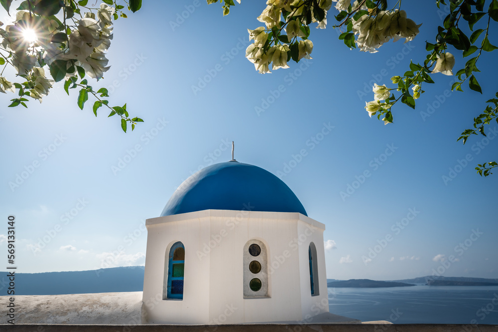 Famous blue dome of an orthodox church in Oia town