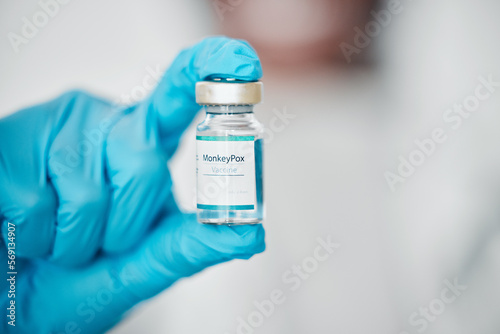 Healthcare, monkeypox virus and doctor with a vaccine for health, safety and wellness at a hospital. Medication innovation, immunization and medical worker with liquid vaccination at medicare clinic.