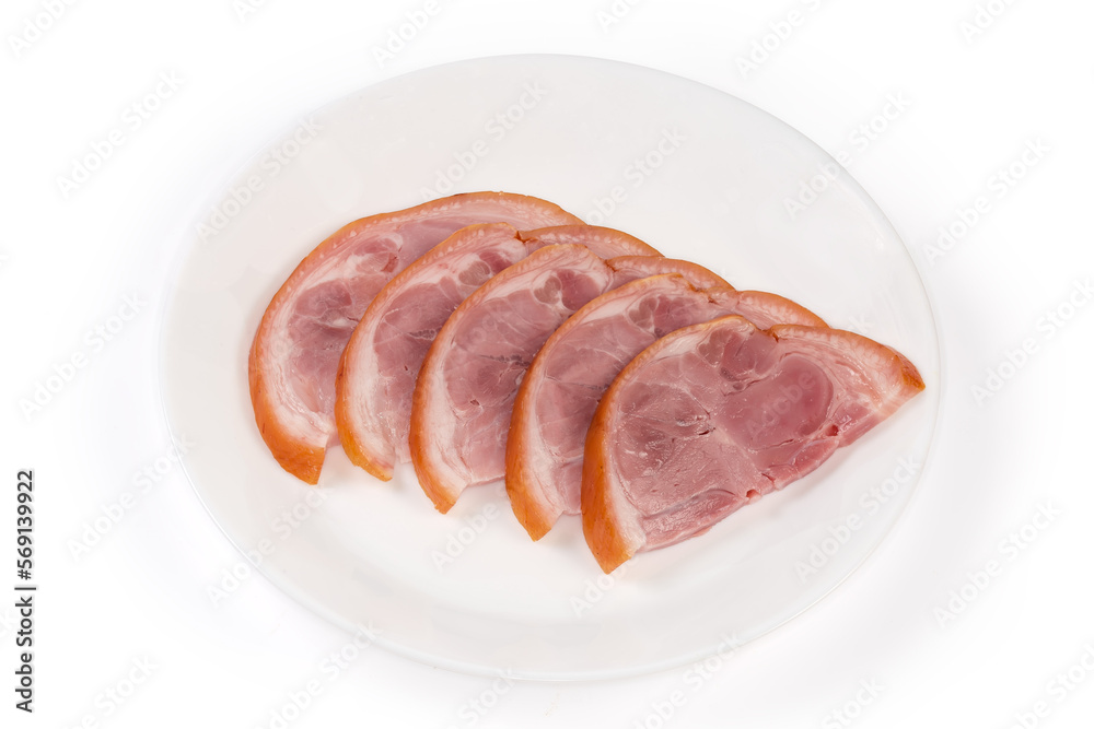 Sliced boiled-smoked pork knuckle on a white plate Sliced boiled-smoked pork knuckle on a white plate