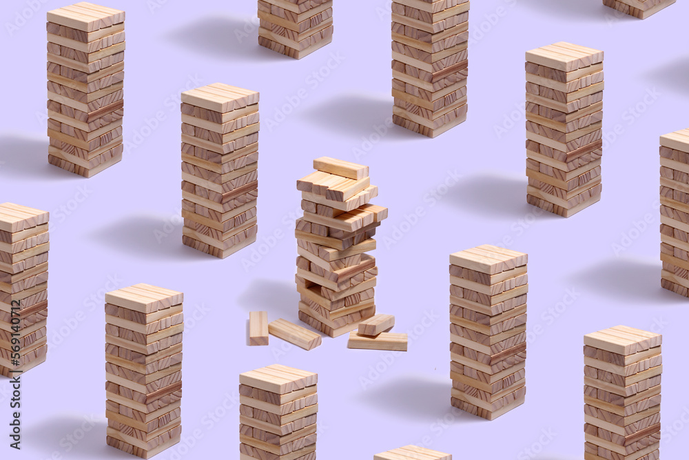 Schematic of a jenga board game with one half-collapsed tower in the middle. Schematic of a jenga board game with one half-collapsed tower in the middle.