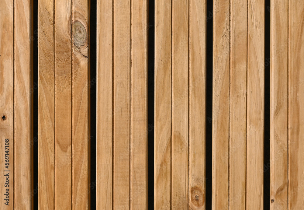 Fondo con detalle y textura de varios listones de madera con lineas y tonos marrones Fondo con detalle y textura de varios listones de madera con lineas y tonos marrones