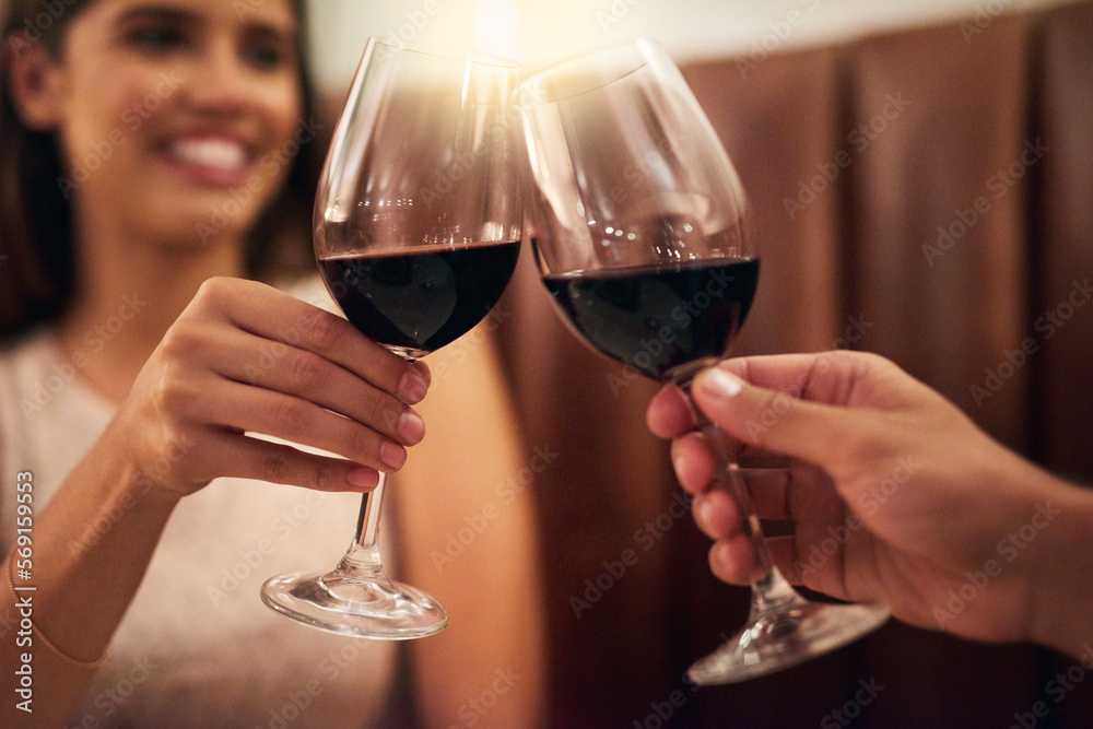 Hand, wine glasses and couple in restaurant for achievement, celebration or romance on Valentines day. Romantic, man or happy woman with zoom, cheers or alcohol for date, affection or toast with love