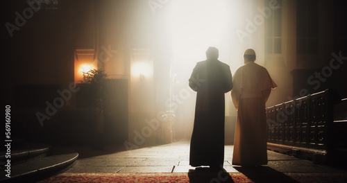 Foto In The Church, A Priest And Pope Share A Conversation Of Faith, Reverence, Hope, Discussing Gospels and Teaching of Jesus Christ and Holy Book