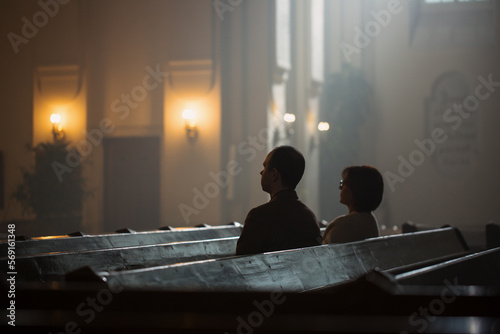 Two People Siting in Church, Praying And Feeling A Connection To God. Man and Woman Believing In The Goodness And Kindness And Finds Solace In Spirituality and Religion, Contemplating Faith