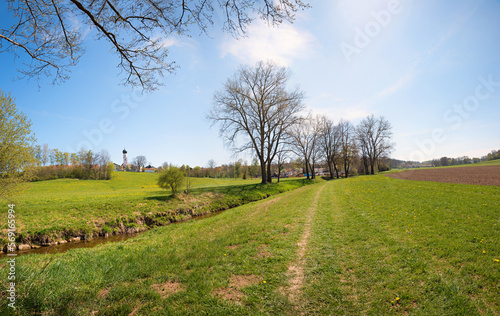walkway along a brook from Schwindegg to Obertaufkirchen in spring