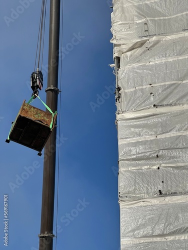 Mobile crane lifting scaffolding 