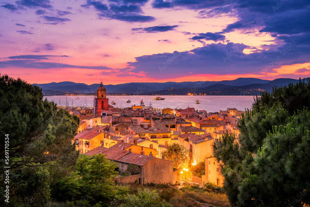 Scenic view of Saint Tropez at evening time against dramatic summer sun