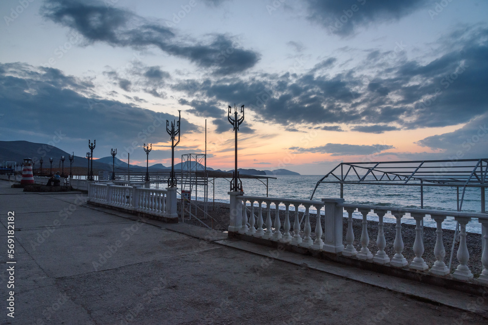 Fototapeta premium Empty embankment of Black sea at spring morning. Koktebel. Crimea