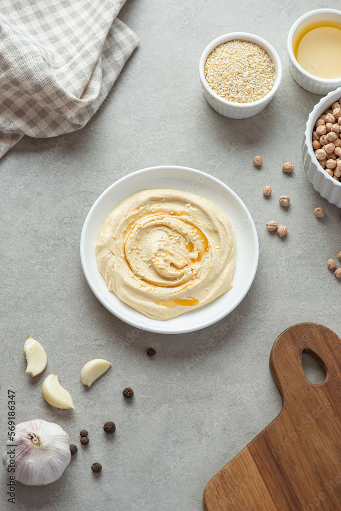 Cooking hummus from chickpeas on the table. curly background. Veganism.