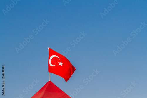 Photography Flag of Turkey flying against a blue sky